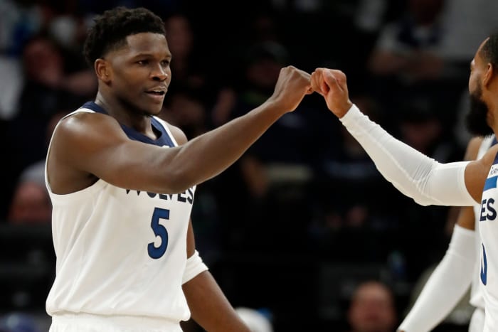 Timberwolves guard Anthony Edwards celebrates after scoring a basket against the Houston Rockets in the third quarter at Target Center.